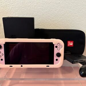 Nintendo Switch with Light Pink Cover with Included Case